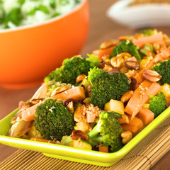 Vegetarian stir-fry Thai-style with broccoli, carrot, mango