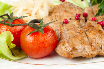 Grilled steak meat with tomato