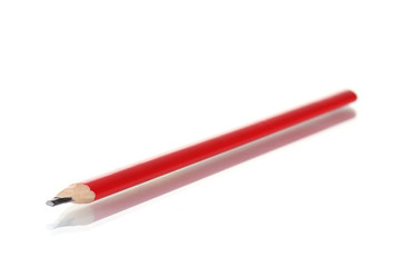 red construction pencil isolated on white