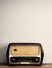 Fototapeta premium antique radio on vintage background