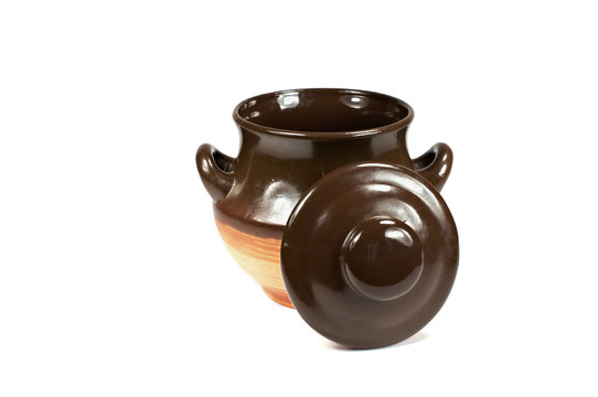 clay pot with a lid on a white background