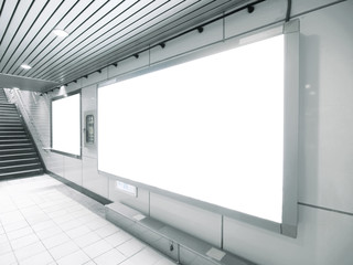 Blank billboard in underground passage