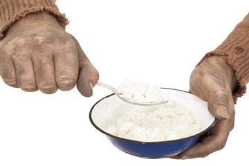 poor man eats rice
