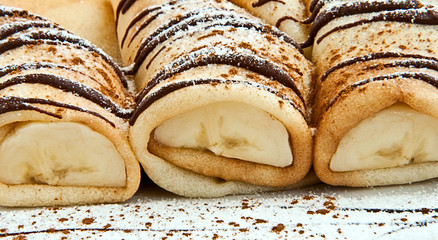 pancakes with banana, chocolate and cinnamon