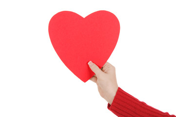 Female Hand Holding a Paper Heart