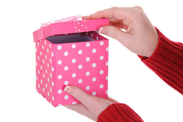 Female Hands Opening a Pink Gift Box