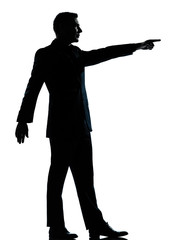 one business man poiting  silhouette