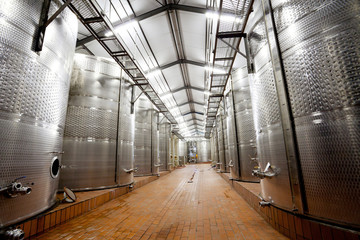 modern wine factory with large storage tanks