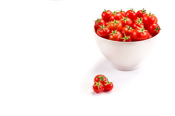 Tomatoes inside white bowl