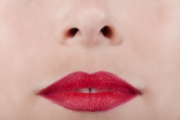 Fototapeta premium Beautiful red lips woman