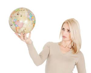 Fototapeta premium Portrait of beautiful woman holding a globe
