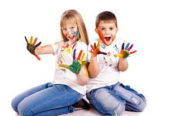 Happy kids with hands painted in colorful paints