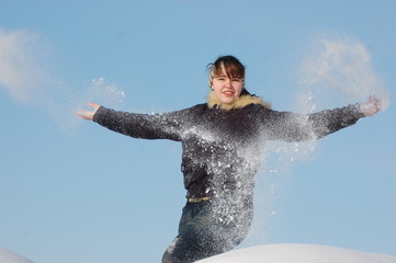 Fototapeta premium eenager girl play in winter time. Near Kiev,Ukraine