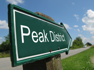Peak District signpost along a rural road