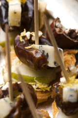 Appetizer Plate with Dactyl, Pecan nuts and Cheese