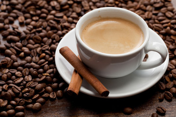 Cup of coffee with cinnamon
