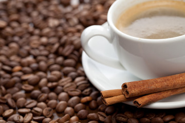 Cup of coffee with cinnamon