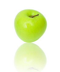 A ripe green apple. Isolated on white