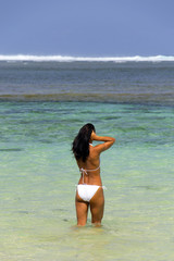 Beautiful woman on Bali beach