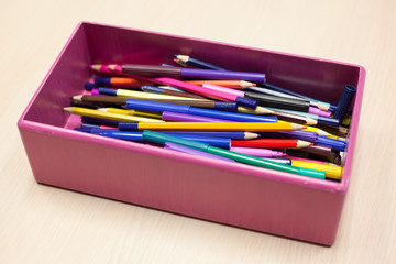 Fototapeta premium colorful pencils in a box