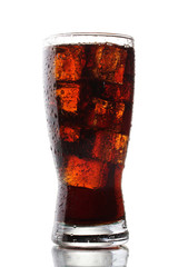 Glass of cola with ice isolated on white