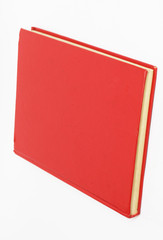 Red book on white background