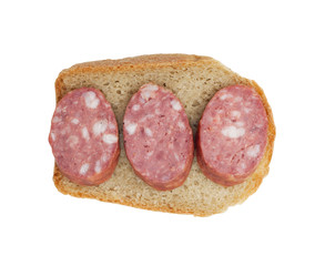 Bread with salami isolated on white background