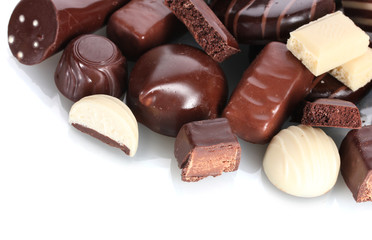 Many different chocolate candy isolated on white