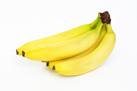 Photo of a sheaf of bananas on a white background
