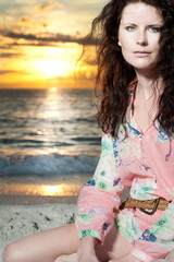 Young girl with long hair at the beach.