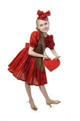 Small playful girl with heart in her hands