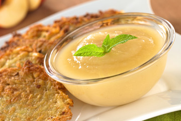 Apple sauce with potato fritters (Selective Focus)