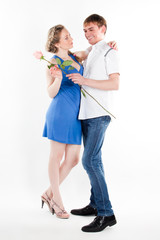 man gives a woman flowers