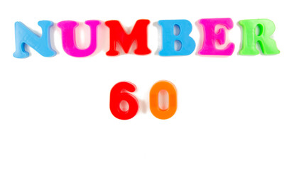 number 60 written in fridge magnets