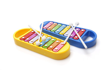 two glockenspiels toy on white background