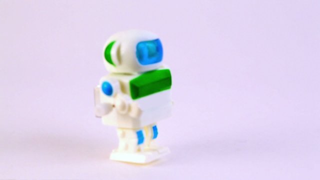 Clockwork toy astronaut walk and then fall down