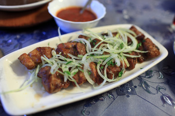 Shashlik with rings of onion