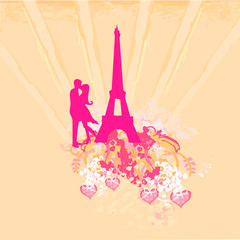 Fototapeta na wymiar Romantic couple in Paris kissing near the Eiffel Tower