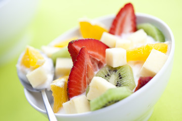 fruit salad with chunks of fruit and yogurt