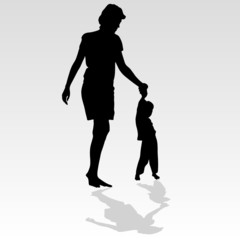 mother holding a child by the hand