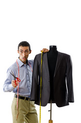 Fototapeta premium Tailor working isolated on white