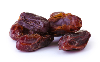 delicious dried dates isolated on white