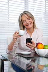 Mature Woman Using Phone