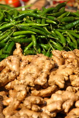 Ginger and green paprica in traditional market in India.