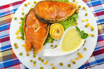 Roasted salmon in the plate