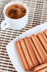 Delicious sugar cookies and a cup of coffee