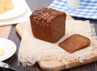 Brown bread with cheese, milk, butter