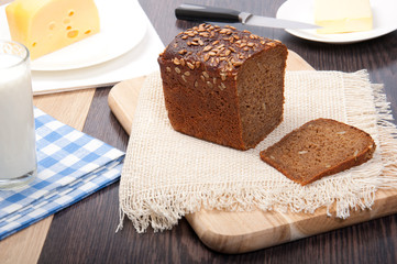 Brown bread with cheese, milk, butter
