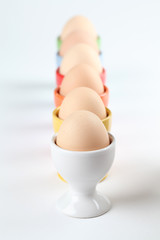 Eggcups with eggs