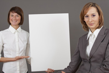 women with white billboard